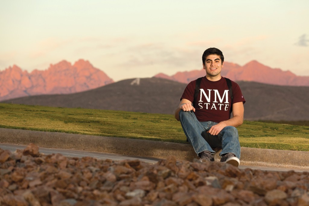 Student posing in front of organ mountains